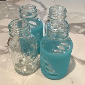 Four Glass Dr. Brown’s Baby Bottles with Accessories